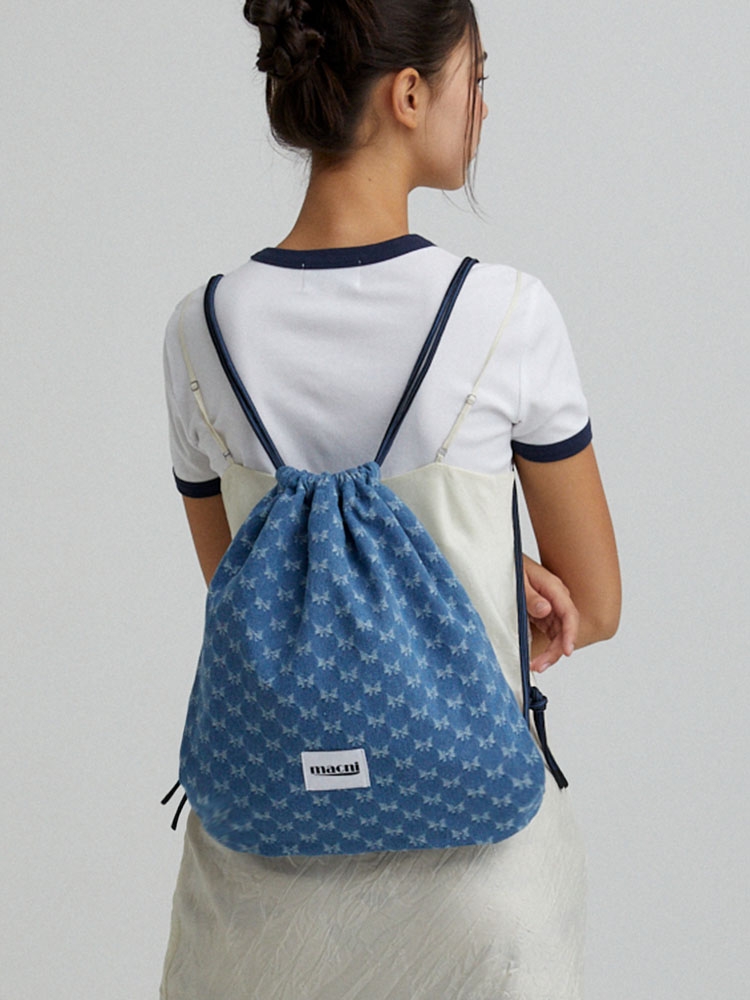 DRAWSTRING DENIM BACKPACK