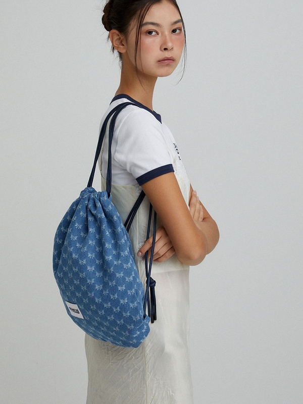 DRAWSTRING DENIM BACKPACK