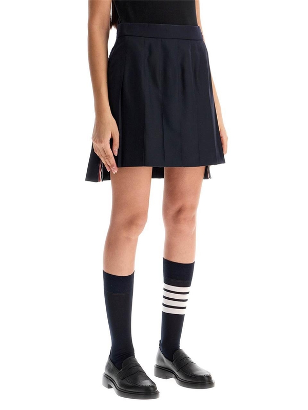 톰 브라운 SS25 wool pleated mini skirt FGC402V 00626 NAVY