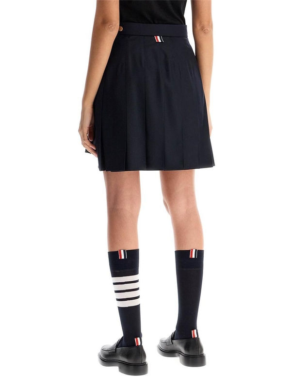 톰 브라운 SS25 wool pleated mini skirt FGC402V 00626 NAVY