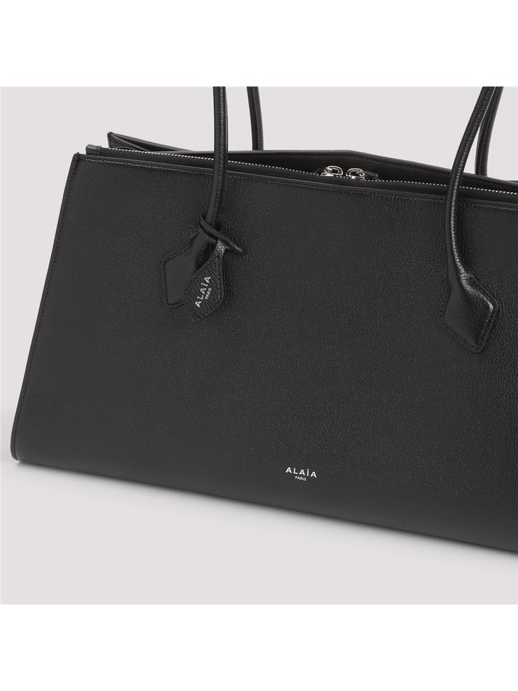 알라이아 SS25 Alaia The Dachshund Tote Bag AA1S06043CA321 Black