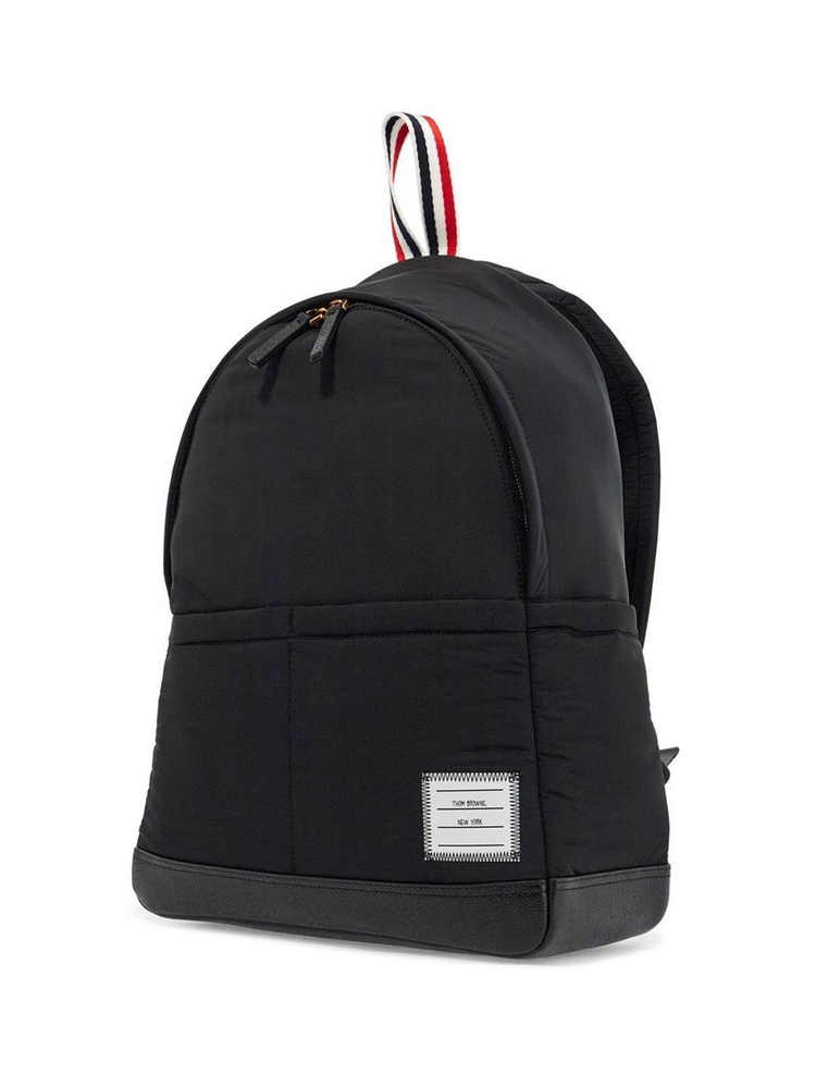 톰 브라운 SS25 black multipocket backpack in polyester and leather with adjustable straps UAG210A 07259 BLACK